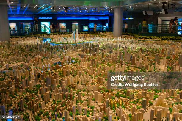 Parts of a huge scale model of the city of Shanghai at the Shanghai Urban Planning Exhibition Center in Shanghai, China.