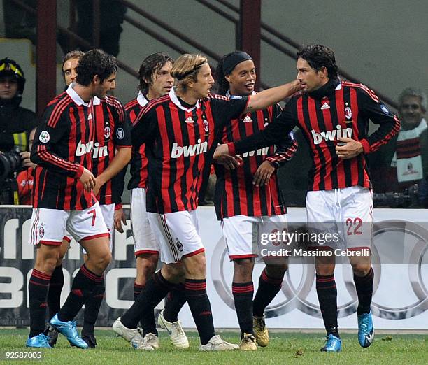 Players of AC Milan celebrate Marco Borriello's second goal during the Serie A match between AC Milan and Parma FC at Stadio Giuseppe Meazza on...