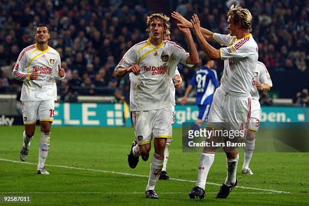 Stefan Kiessling of Leverkusen celebrates scoring the second goal with team mate Sami Hyypiae during the Bundesliga match between FC Schalke 04 and...