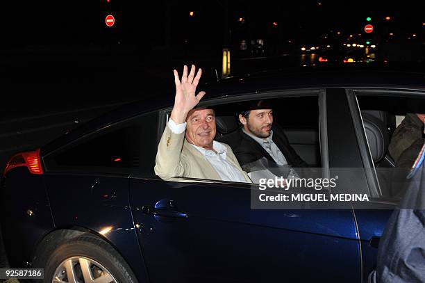 Former French president Jacques Chirac gestures as he arrives at his Paris apartment on October 31, 2009. Chirac will be the first former French...