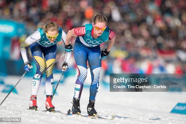 Jessica Diggins of the United States and Stina Nilsson of Sweden in action during the Cross-Country Skiing - Ladies' 30km Mass Start Classic at the...
