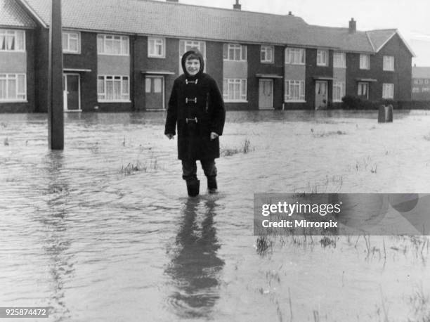 Local resident of Brambles Farm Middlesbrough makes their way through the flood water 2nd November 1968.