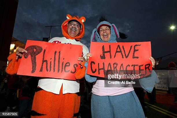 Mario and Linda Lagrotte of Bucks County, PA pose for a photo wearing halloween costums while holding up signs in support of the Philadelphia...
