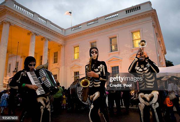 Performers greet over two thousand local school children during a Halloween celebration on the north lawn of the White House on October 31, 2009 in...