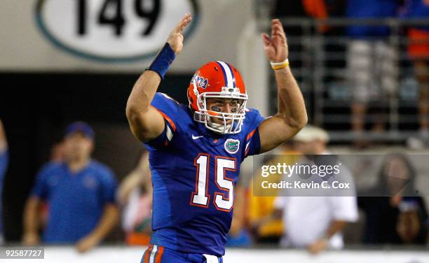 Quarterback Tim Tebow of the Florida Gators reacts after being pulled for the second-team offense during the game against the Georgia Bulldogs at...