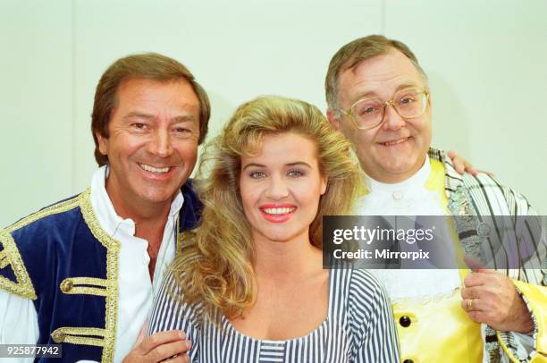 The cast of Cinderella at the Birmingham Hippodrome, including Des O'Connor as Buttons, Jodie Wilson as Cinderella and Ian Smith as Baron Hardup,...