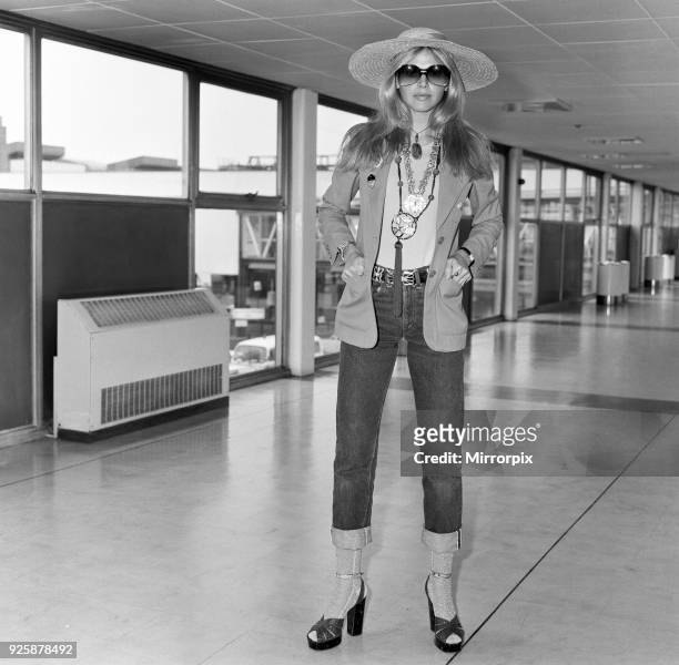 Britt Ekland leaves London Airport for Bangkok, where she is due to start filming 'The Man with the Golden Gun', 13th April 1974.