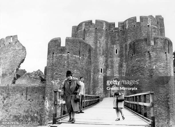 Caerphilly Castle, a medieval fortification in Caerphilly in South Wales, 21st May 1968. Pictured, the castle's famous leaning tower on the left. Two...