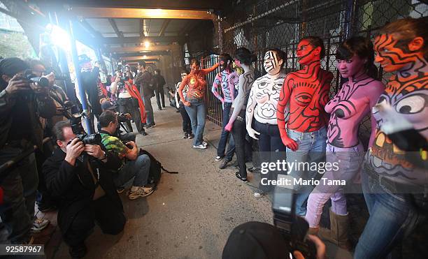Photographers take pictures of participants before the start of the annual Village Halloween Parade October 31, 2009 in New York City. Approximately...