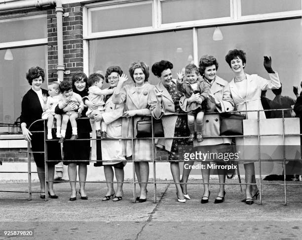 Wives and girlfriends of the Everton football team wave their last goodbye as the plane taking them off to Australia for a tour departs from Speke...
