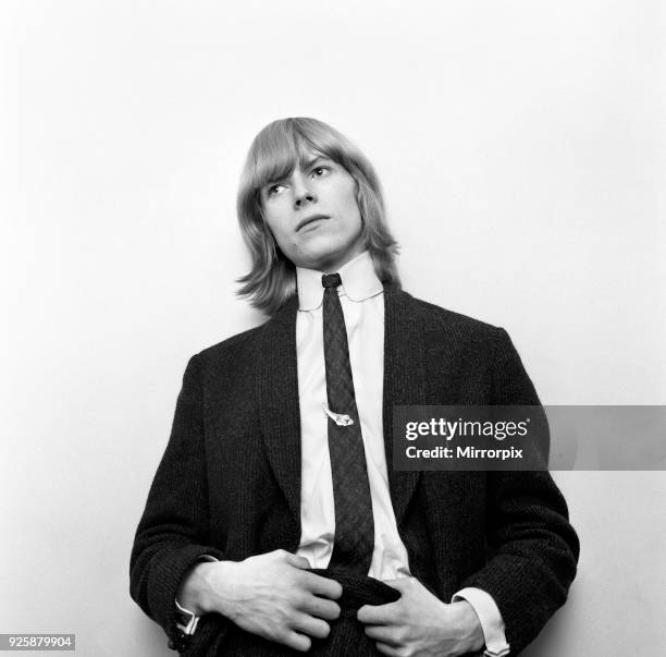 British pop singer David Bowie pictured when he was known as Davie Jones, outside the BBC Television Centre waiting to speak to Barry Langford,...