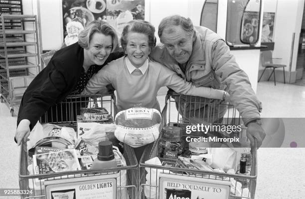 Trolley dash winner Marjorie Stansfield pictured with Susan Wilkinson of ASDA and Lions President Gerlad Higginson at ASDA Birkby, 11th December 1991.