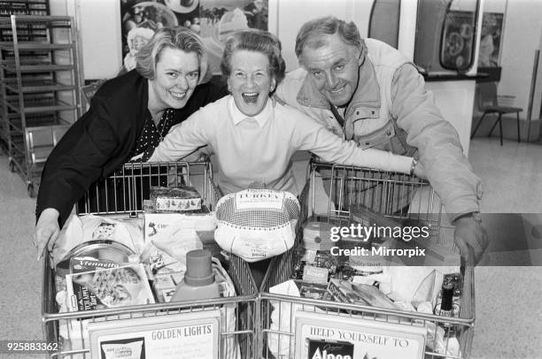 Trolley dash winner Marjorie Stansfield pictured with Susan Wilkinson of ASDA and Lions President Gerlad Higginson at ASDA Birkby, 11th December 1991.