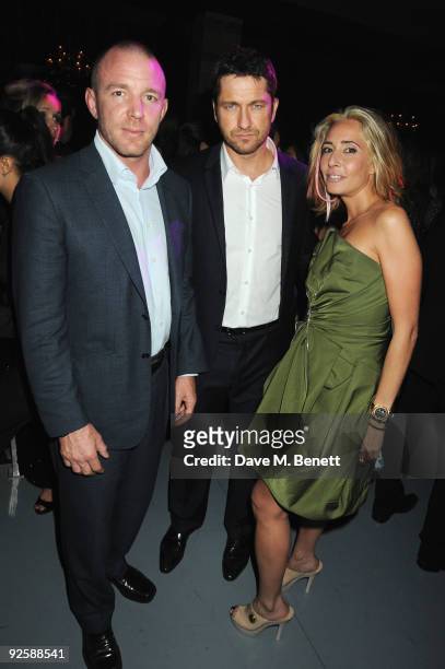 Director Guy Ritchie with actor Gerard Butler and guest attends the grand opening night of the Kerzner Mazagan Beach Resort on October 31, 2009 in El...