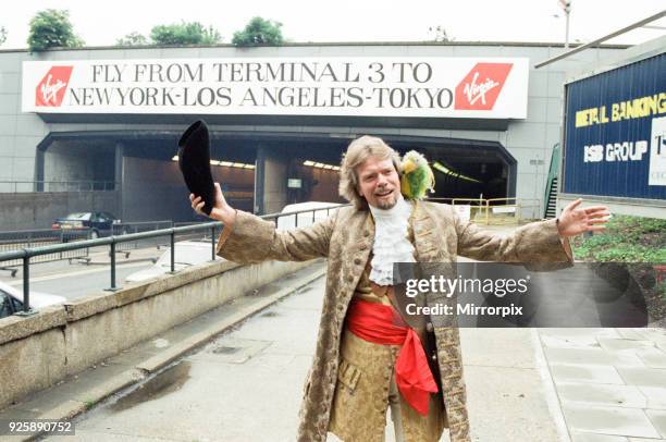 Richard Branson seen here at the entrance of the tunnel leading to the Heathrow terminals dressed as a pirate on the day the first Virgin airways...