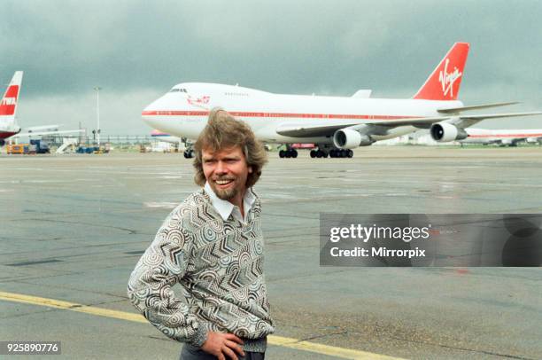 Richard Branson seen here on the apron at Heathrow to welcome the first Virgin airways flight to arrive at Heathrow, 1st July 1991.