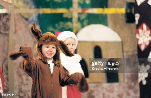 Daniel Holmes is Rudolph and Stephen Davies Santa at St Albert's School, Stockbridge Village, 15th December 1995.