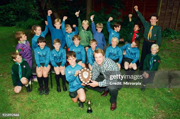 1st Eaglescliffe Cubs Football Team are presented with medals and a shield by Boro player Alan Kernaghan. Skipper Liam Smith with Alan & his team....