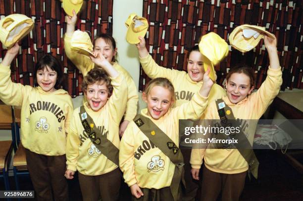 Members of the 1st Billingham Brownie pack celebrating getting a cash grant to be spent on tables and chairs and maintaining their hall in Langdale...