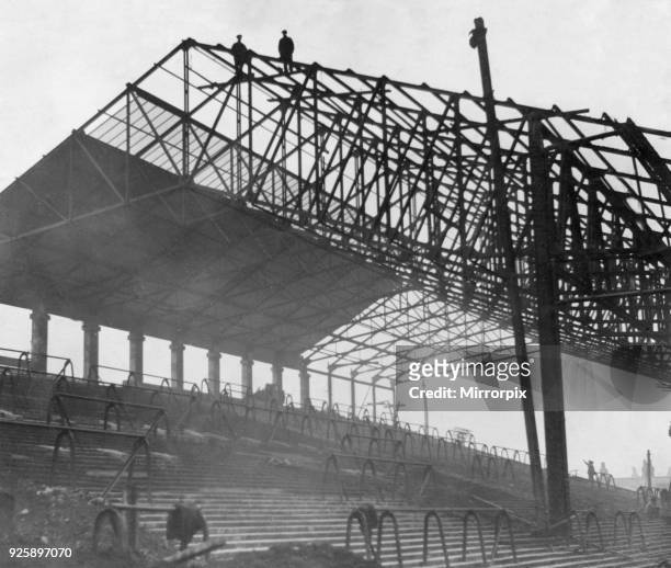 The new Spion Kop stand under construction at Liverpool's Anfield Ground. Construction had been held up whilst waiting for a delivery of British...