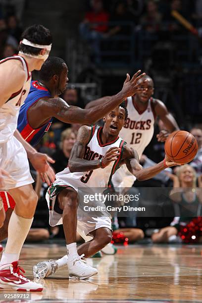 Brandon Jennings of the Milwaukee Bucks passes the ball upcourt after a steal against Rodney Stuckey of the Detroit Pistons on October 31, 2009 at...