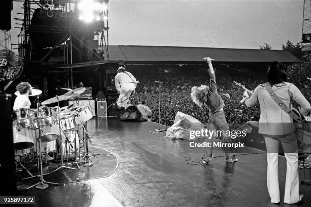 The Who rock group performing at The Valley, home of Charlton Athletic football club. Pictured left to right are: Keith Moon on drums, Pete...