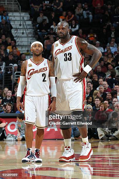 Mo Williams and Shaquille O'Neal of the Cleveland Cavaliers wait for the game against the Charlotte Bobcats to resume on October 31, 2009 at Quicken...