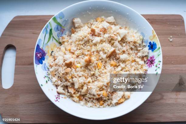 making celeriac bake - breadcrumb stock pictures, royalty-free photos & images