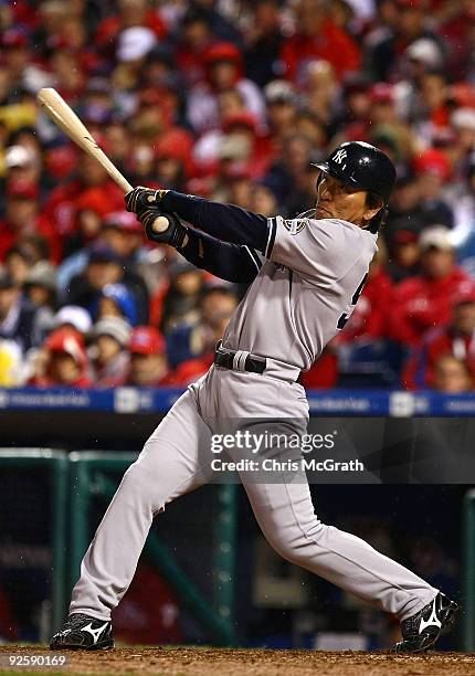 Hideki Matsui of the New York Yankees connects for a homerun in the eighth inning against the Philadelphia Phillies in Game Three of the 2009 MLB...