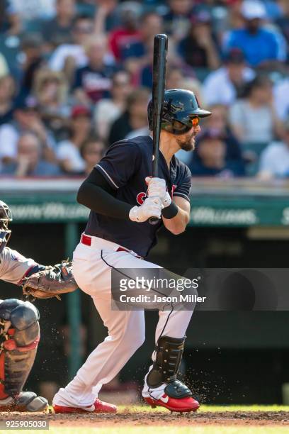 Lonnie Chisenhall of the Cleveland Indians singles during the fourth inning against the Minnesota Twins at Progressive Field on June 24, 2017 in...