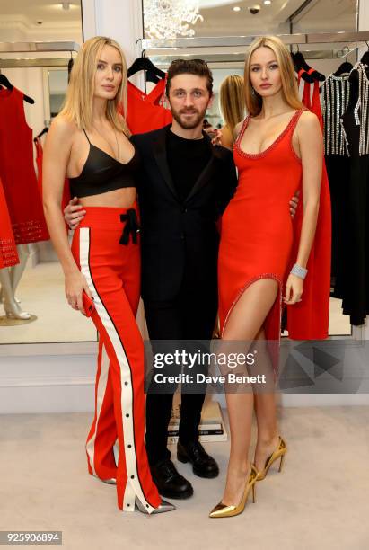 Kristina Romanova, David Koma and Masha Markova Hanson attends the David Koma SS18 collection presentation at 29 Lowndes on February 28, 2018 in...