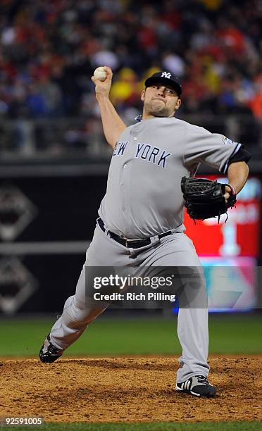 Joba Chamberlain pitches during Game Three of the 2009 MLB World Series at Citizens Bank Park on October 31, 2009 in Philadelphia, Pennsylvania.