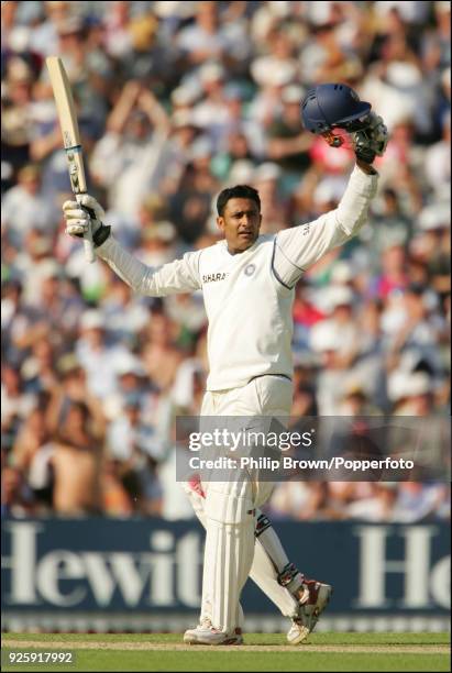 Anil Kumble of India celebrates his first Test century during his innings of 110 in the 3rd Test match between England and India at The Oval, London,...