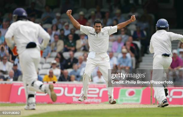 Anil Kumble of India celebrates getting the wicket of England batsman Alastair Cook during the 3rd Test match between England and India at The Oval,...