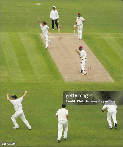 Ryan Sidebottom of England gets the wicket of West Indies batsman Devon Smith during the 4th Test match between England and West Indies at the...