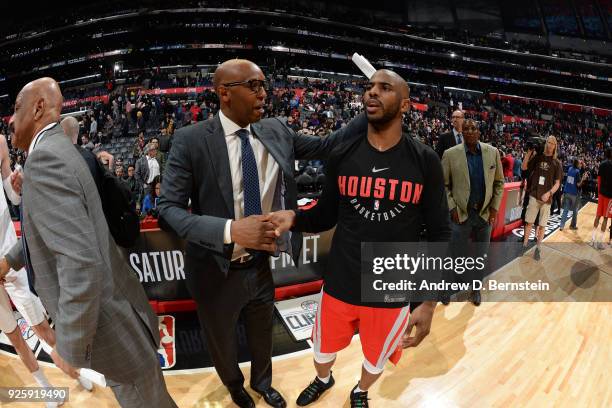 Sam Cassell of the LA Clippers and Chris Paul of the Houston Rockets shake hands after the game on February 28, 2018 at STAPLES Center in Los...