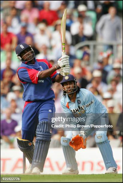 England batsman Dimitri Mascarenhas hits his 4th six in a row off Yuvraj Singh of India during the 6th NatWest Series One Day International between...