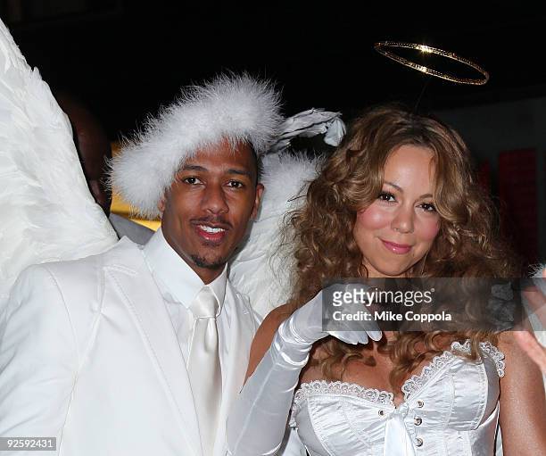 Actor-TV personality Nick Cannon and singer Mariah Carey attends a Halloween celebration at M2 Ultra Lounge on October 31, 2009 in New York City.