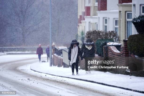 People battle against the snow as Storm Emma and the 'Beast form the East hit South Wales on March 1, 2018 in Newport, United Kingdom. Freezing...
