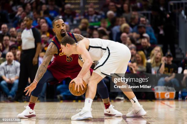 Smith of the Cleveland Cavaliers guards Joe Harris of the Brooklyn Nets during the first half at Quicken Loans Arena on February 27, 2018 in...