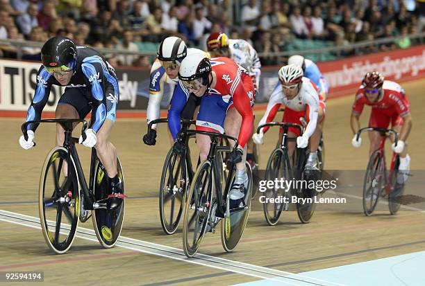 Ross Edgar of Great Britain and SKY+HD team leads Jason Kenny of Great Britain in the first round of the Men's International Keirin on day three of...