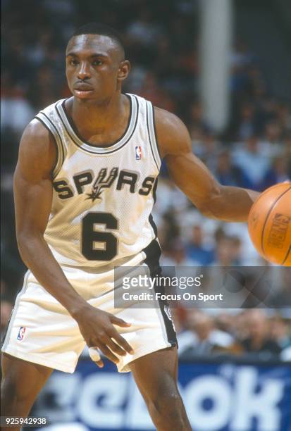 Avery Johnson of the San Antonio Spurs dribbles the ball during an NBA basketball game circa 1992 at the HemisFair Arena in San Antonio, Texas....