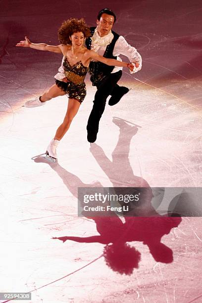 Pairs gold medalists Shen Xue and Zhao Hongbo of China perform during the Cup of China ISU Grand Prix of Figure Skating 2009 at Beijing Capital...