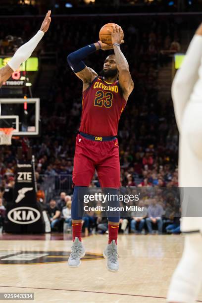 LeBron James of the Cleveland Cavaliers shoots a jump shot against the Brooklyn Nets during the first half at Quicken Loans Arena on February 27,...