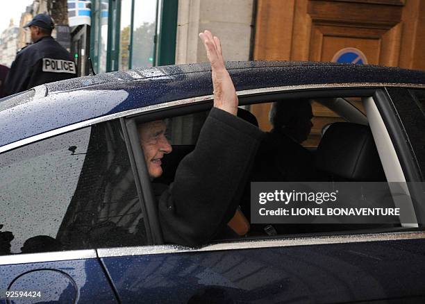 Former French president Jacques Chirac gestures as he arrives at his Paris apartment on November 1, 2009. Chirac will be the first former French...