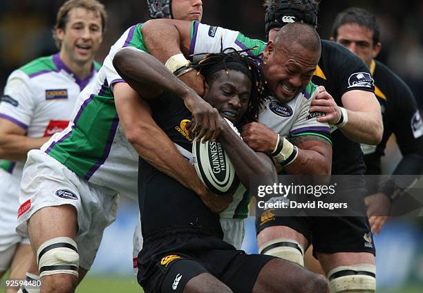 Paul Sackey of Wasps is tackled by Villiame Ma'asi during the Guinness Premiership match between London Wasps and Leeds Carnegie at Adams Park on...