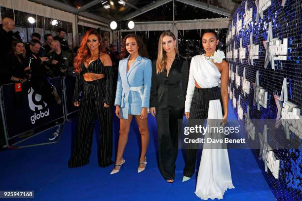 Jesy Nelson, Jade Thirlwall, Perrie Edwards and Leigh-Anne Pinnock of Little Mix attend The Global Awards 2018 at Eventim Apollo, Hammersmith on...