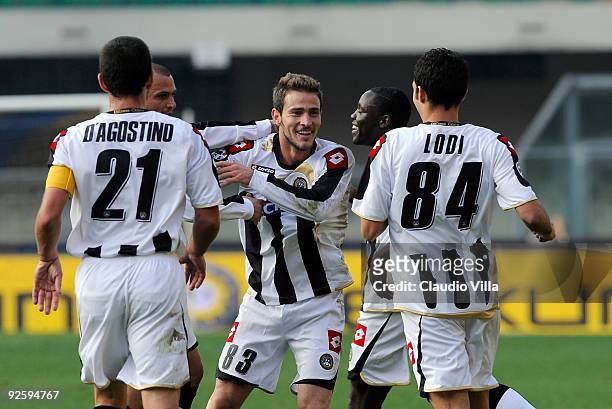 Antonio Floro Flores of Udinese Calcio is congrtaulated after the first goal during the Serie A match between AC Chievo Verona and Udinese Calcio at...