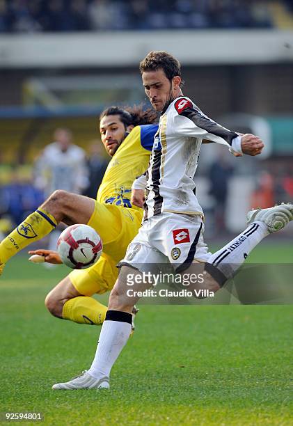 Antonio Floro Flores of Udinese Calcio scores the first goal during the Serie A match between AC Chievo Verona and Udinese Calcio at Stadio...