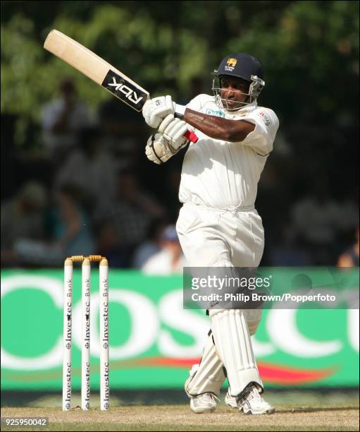 Sanath Jayasuriya, playing in his last Test for Sri Lanka, hits a boundary during the 1st Test match between Sri Lanka and England at Asgiriya...